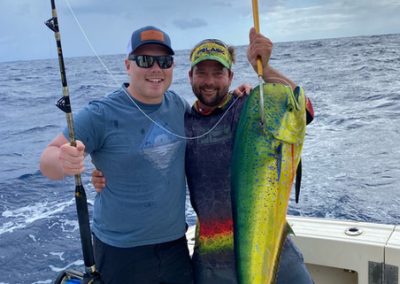 Proud of their deep sea fish dinner